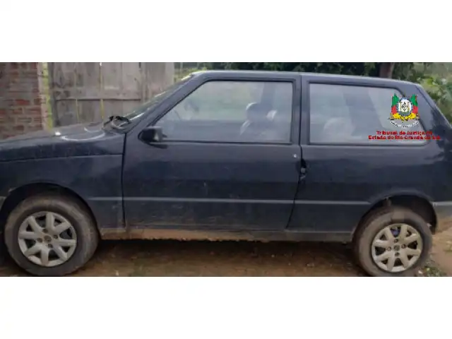 LEILÃO DE UM FIAT/UNO ELETRONIC, ANO/MOD 1993