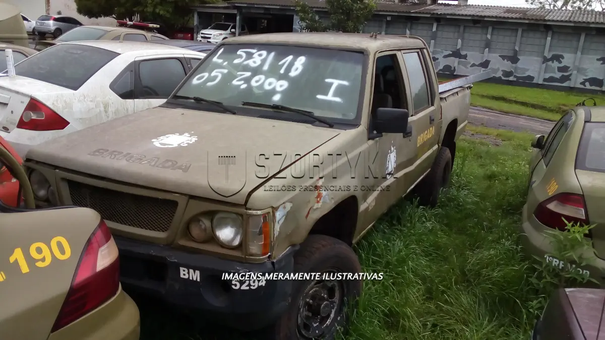 LOTE 058 - MMC/L200 4X4 GL, ANO 2005.