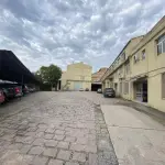 CONJUNTO DE PRÉDIOS EDIFICADOS EM TERRENO COM 14.444, 57 M² NA PRAÇA VINTE DE SETEMBRO EM PELOTAS.